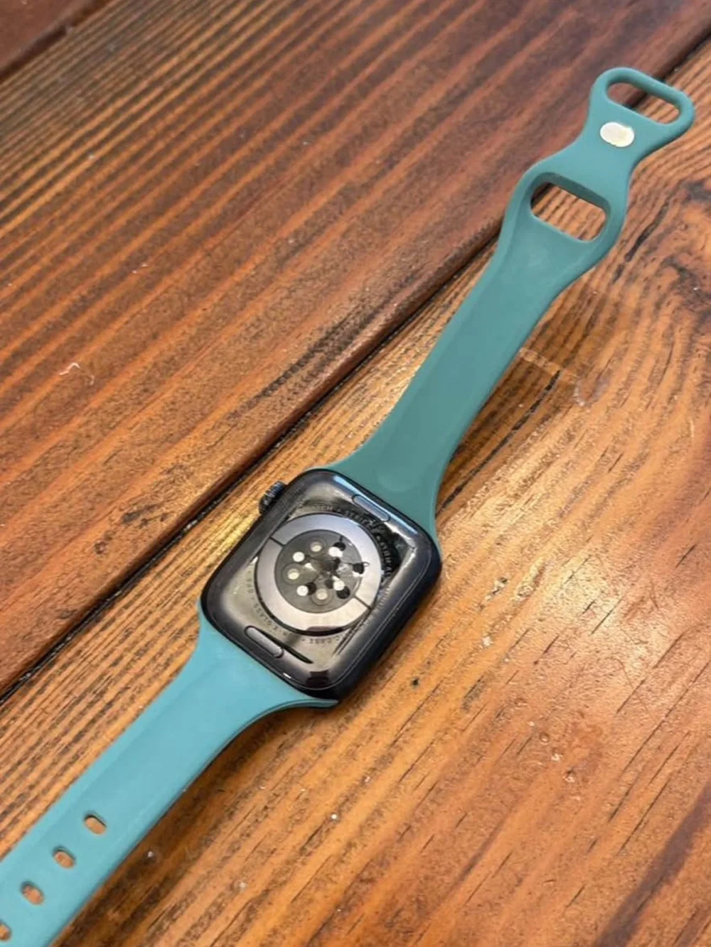 Apple Smartwatch with Teal Sport Band